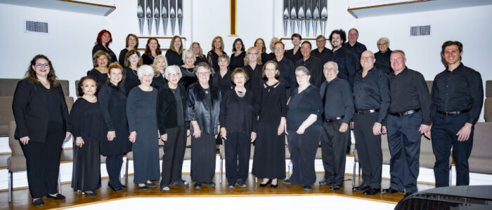Choir members posing for group photo at st andrews presbyterian chruch